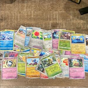 Exactly 50 Reverse Holo Pokémon Cards.